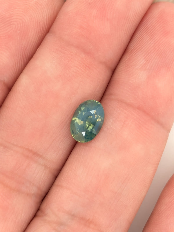 1.64ct Opalescent Teal Sapphire Oval