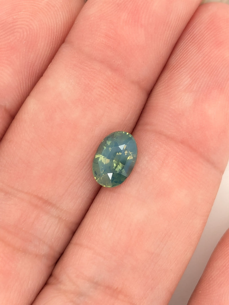 1.64ct Opalescent Teal Sapphire Oval
