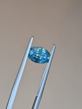 1.64ct Opalescent Teal Sapphire Oval