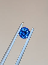 0.58ct Color Change Sapphire Round